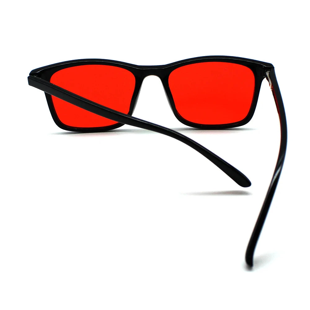 New blue light blocking glasses with red and orange lenses for fatigue protection and fashionable design wearing during gaming