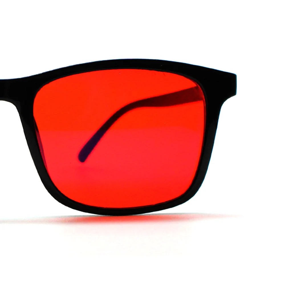 New blue light blocking glasses with red and orange lenses for fatigue protection and fashionable design wearing during gaming