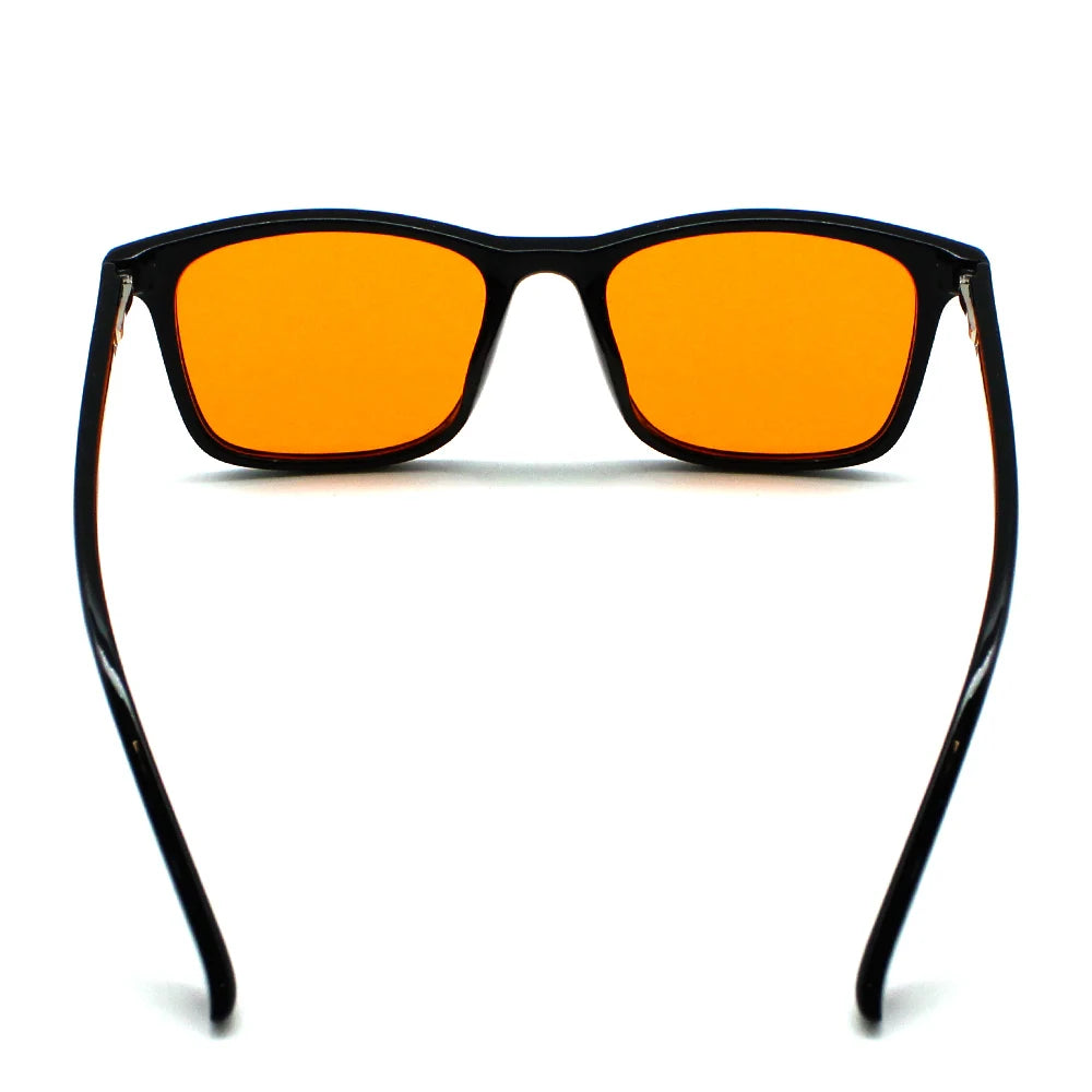 New blue light blocking glasses with red and orange lenses for fatigue protection and fashionable design wearing during gaming
