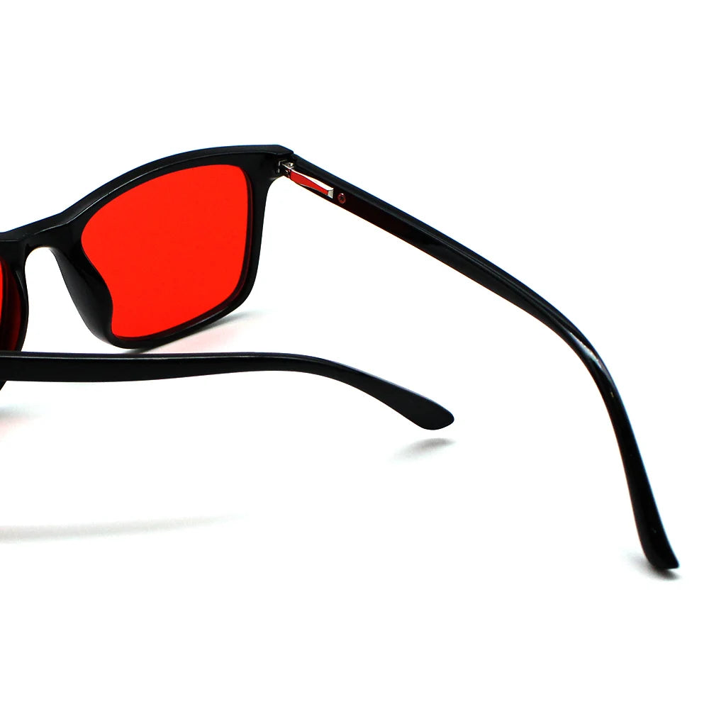 New blue light blocking glasses with red and orange lenses for fatigue protection and fashionable design wearing during gaming
