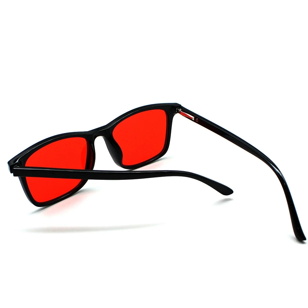 New blue light blocking glasses with red and orange lenses for fatigue protection and fashionable design wearing during gaming