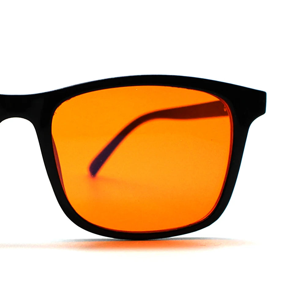 New blue light blocking glasses with red and orange lenses for fatigue protection and fashionable design wearing during gaming