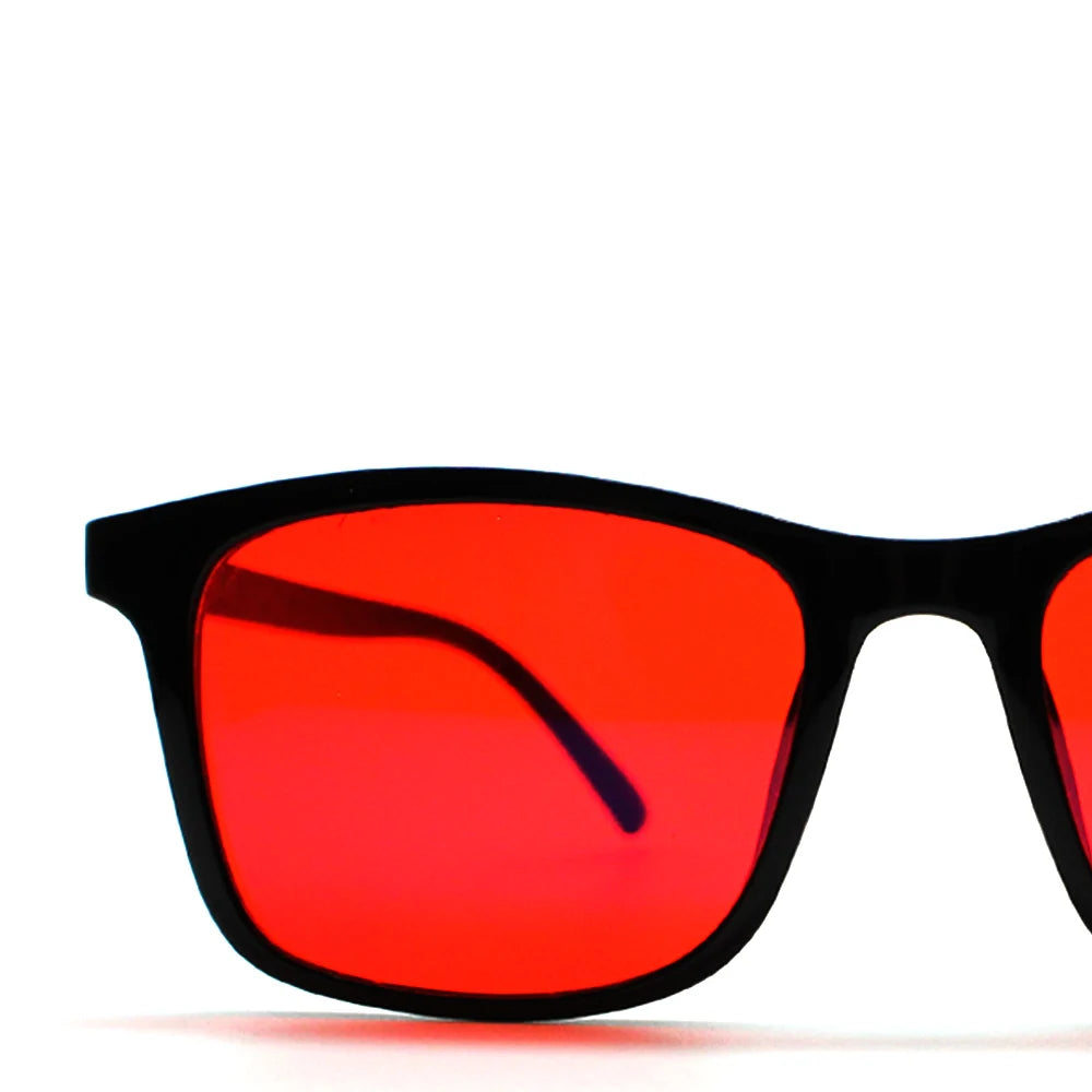 New blue light blocking glasses with red and orange lenses for fatigue protection and fashionable design wearing during gaming