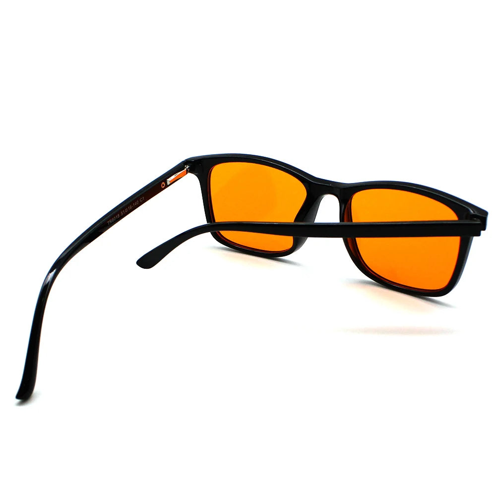 New blue light blocking glasses with red and orange lenses for fatigue protection and fashionable design wearing during gaming